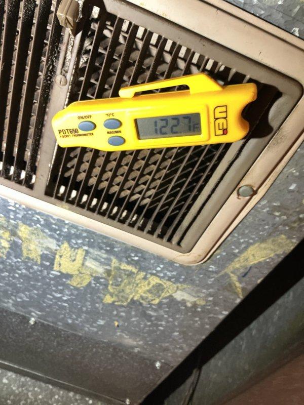 # Heating System Tune-Up and Maintenance

Performed comprehensive annual maintenance on a 15-year-old furnace system. Conducted thorough inspection of all mechanical components, including blower assembly, heat exchanger, and mounting hardware. Examined vibration dampening grommets and mounting brackets, noting age-appropriate wear and surface corrosion on metal framework. All mounting components remain functional despite cosmetic deterioration.

Tested system operation and measured supply air temperature at floor register, recording 122.4°F output, which falls within acceptable operating parameters for heating mode. Verified proper airflow distribution through vent registers. Cleaned accumulated dust and debris from accessible components and vent surfaces.

Inspected burner assembly, gas connections, and ignition system. Verified proper furnace cycling and flame characteristics. Checked electrical connections and control board operation. All safety controls tested and functioning prope