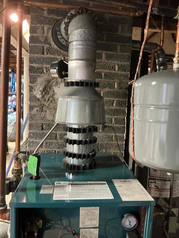 Performed annual maintenance on 15-year-old residential boiler system. Completed comprehensive inspection of burner assembly, heat exchanger, and all internal components with access panel opened for thorough evaluation. Verified proper operation of expansion tank, checked system pressures, and inspected all copper piping connections for leaks or corrosion.
