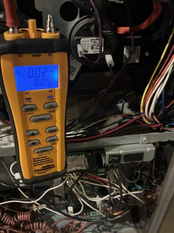 Completed comprehensive furnace tune-up on 17-year-old heating system. Performed diagnostic testing using dual port manometer to verify proper gas pressure and system operation, inspected heat exchanger coils, electrical connections, and all internal components. All measurements within normal operating parameters; system functioning properly with no issues identified.