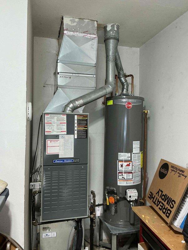 Completed scheduled maintenance on 17-year-old American Standard gas furnace with Janitrol Inteli control board. Performed comprehensive tune-up including filter inspection, burner assembly cleaning, heat exchanger visual inspection, and blower motor lubrication. Verified proper operation of control board with all LED indicators functioning correctly, tested safety controls, and confirmed all electrical connections secure at terminal blocks. System operating within normal parameters upon completion.
