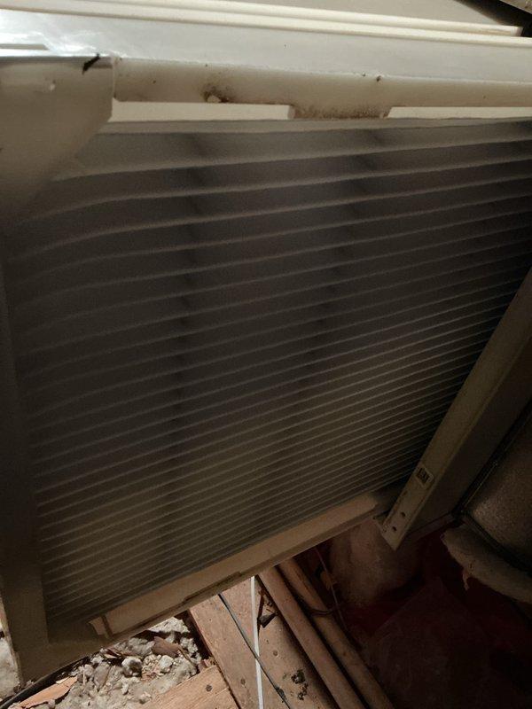 Completed scheduled heating maintenance on a 20-year-old gas furnace system. Inspected and evaluated evaporator coil and air filter assembly, noting accumulated dust and debris buildup on surrounding surfaces and framework. Performed diagnostic testing using temperature probes and verified system level and operational parameters to ensure proper heating function for the season.
