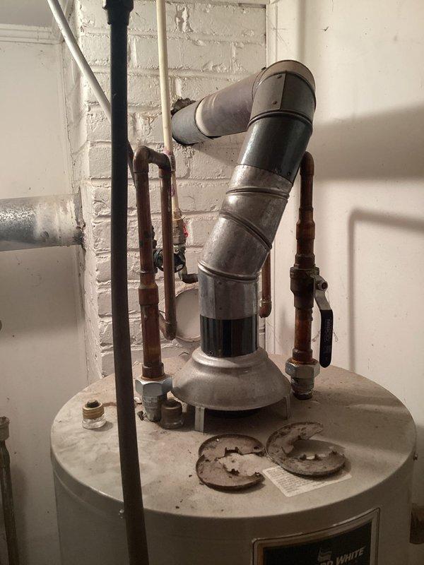 Completed comprehensive evaluation of existing heating system for boiler replacement estimate. Inspected aging boiler equipment, expansion tank, copper piping network, and associated hydronic heating components showing significant wear, corrosion, and oxidation throughout the system. Documented current installation conditions, measured equipment specifications, assessed venting requirements, and photographed existing setup to provide accurate replacement recommendations and specifications for new high-efficiency boiler system installation.