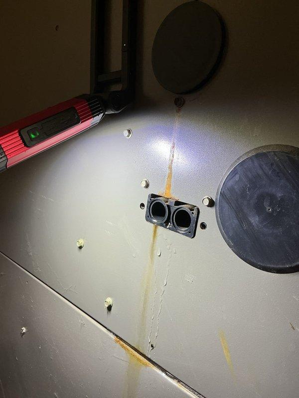 Completed comprehensive winter furnace maintenance and tune-up on residential heating system. Performed full system inspection, including examination of heat exchanger, burner assembly, and blower components. Documented evidence of historical condensate staining on furnace cabinet panels, indicating normal operational condensation drainage patterns over time. Verified all electrical connections, tested safety controls, and confirmed proper venting through PVC condensate system. System operating within manufacturer specifications with no immediate service concerns identified.