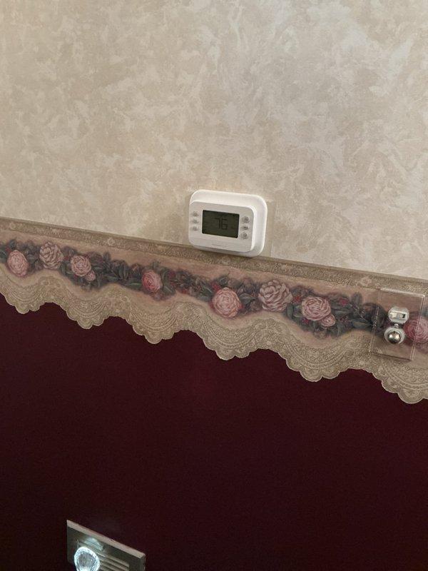 Installed a downflow Lennox Elite Series furnace rated at 110,000 BTU with complete gas and electrical connections. Configured dual-zone system with two Honeywell thermostats to provide independent temperature control for separate areas. Inspected and addressed failed damper in crawlspace serving bedroom zone, ensuring proper airflow distribution throughout the ductwork system.