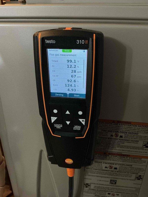 Completed comprehensive furnace tune-up and maintenance on 9-year-old Carrier heating system. Performed combustion analysis using Testo 310 II flue gas analyzer, which confirmed safe and efficient operation with readings of 28 ppm CO, 67 ppm CO air-free, 92.6% efficiency, and proper oxygen levels at 12.2%. All system components inspected and operating within manufacturer specifications with no issues identified.