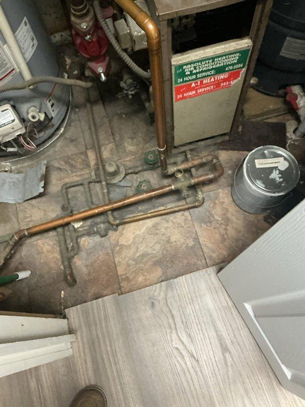Responded to complaint of noisy pipes on steam boiler system at 120 SC location. Upon inspection, identified water hammer and thermal expansion issues in the steam piping distribution system connected to the gas-fired boiler. Documented existing conditions including aged copper piping with varying degrees of oxidation, multiple shut-off valves, and interconnected plumbing configuration serving both the heating system and domestic water heater. Recommended addressing pipe support and potential steam trap maintenance to eliminate noise concerns.