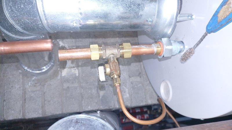 Replaced faulty shut-off valve on humidifier water supply line. Installed new brass valve with compression fittings on copper waterline to restore proper water flow control to humidifier system.