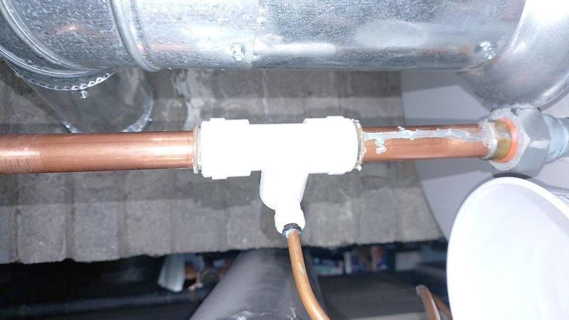 Replaced faulty shut-off valve on humidifier water supply line. Installed new brass valve with compression fittings on copper waterline to restore proper water flow control to humidifier system.