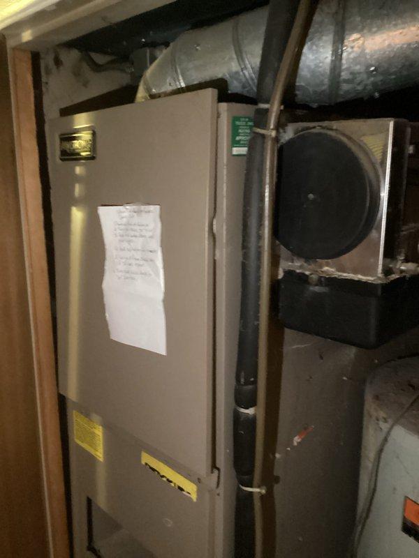 Completed comprehensive estimate for full HVAC system replacement and water heater installation in residential property. Assessed existing basement-mounted air handler unit, associated ductwork including main supply trunk lines and rectangular plenum connections in attic space, and evaluated current water heater for replacement specifications. Documented all equipment locations, existing infrastructure conditions, and photographed installation areas to provide accurate replacement scope and system sizing recommendations.