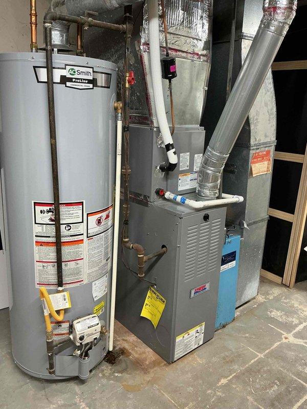 Responded to no-heat call affecting entire residence. Upon arrival, diagnosed control board failure on relatively newer furnace unit. Replaced defective integrated circuit board with OEM replacement part, restored power, and verified proper ignition sequence and heating operation throughout system.