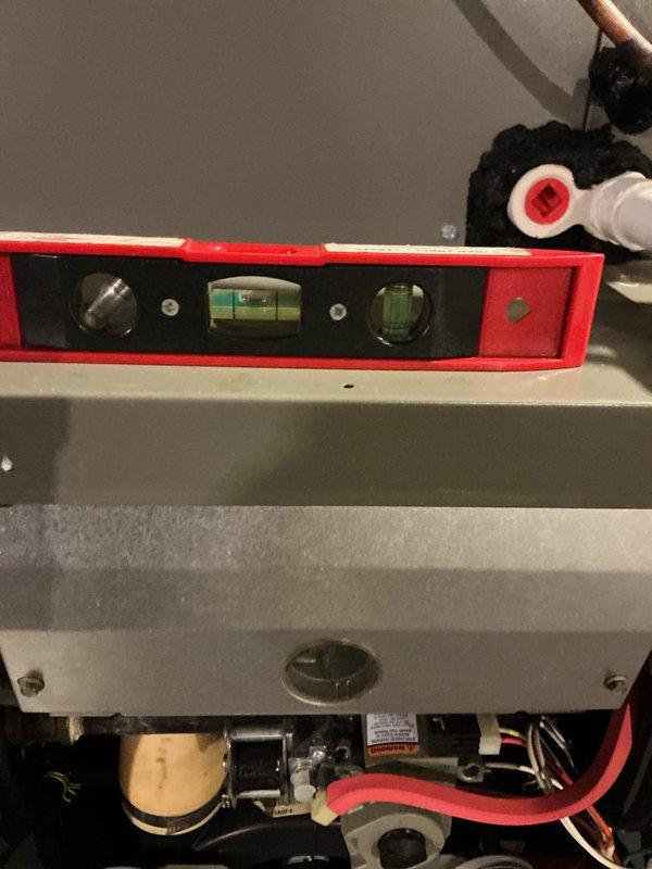 Completed comprehensive furnace tune-up on 17-year-old heating system, performing standard maintenance procedures including combustion analysis, safety checks, and system diagnostics. Verified proper electrical voltage readings at 636V using multimeter and confirmed unit levelness with precision measuring tools. Customer opted to renew maintenance agreement during visit, ensuring continued service coverage for the heating system.