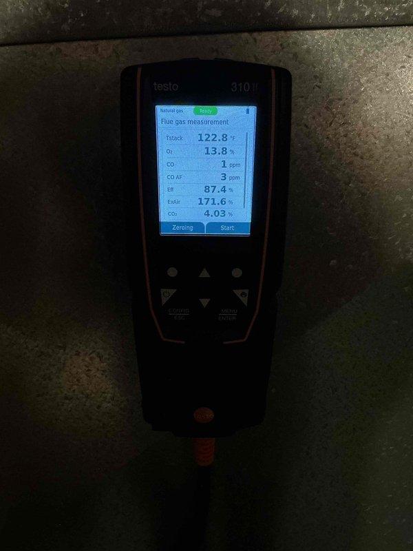 Completed comprehensive heating maintenance on a 14-year-old system under the MVP maintenance plan. Performed combustion analysis using Testo 310 II flue gas analyzer, recording stack temperature of 122.8°F, oxygen level of 13.8%, carbon monoxide readings of 1-3 ppm air-free, and combustion efficiency of 87.4-90.3%. All readings indicate proper burner operation and safe system performance within manufacturer specifications.