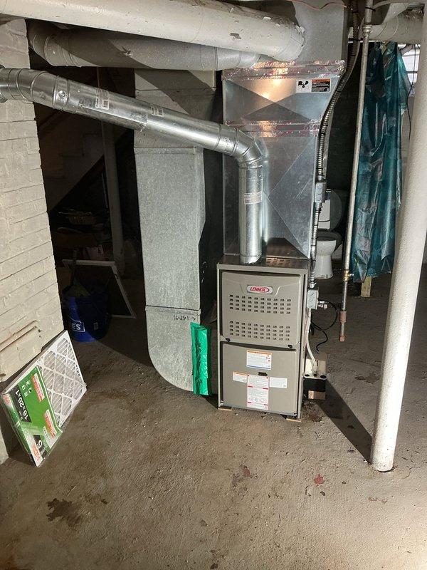 Completed installation of a Lennox upflow 80% efficiency 90,000 BTU residential furnace in basement mechanical room. Established all required metal gas piping and electrical connections to meet code specifications, installed 120-volt condensate pump for proper drainage, and mounted WiFi-enabled digital thermostat on main level for remote temperature control and system monitoring.