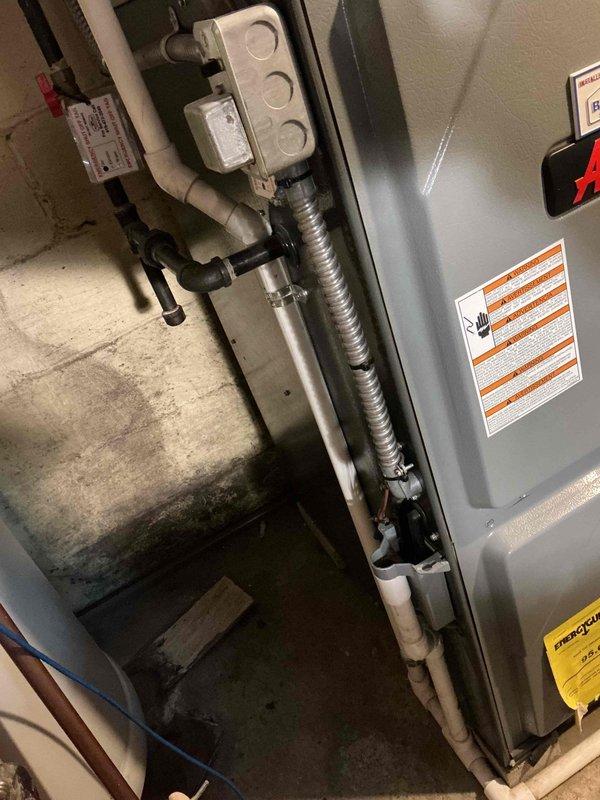 Completed comprehensive heating maintenance on a 15-year-old residential gas furnace system. Performed full system inspection including burner assembly, heat exchanger, blower motor, and all safety controls. Verified proper operation of Aprilaire humidifier unit and tested thermostat functionality. Inspected all electrical connections, gas line integrity, and PVC condensate drainage system. Cleaned and tested ignition system, confirmed proper flame characteristics, and measured temperature rise across heat exchanger within manufacturer specifications. All components found operating within normal parameters with no immediate repairs required.