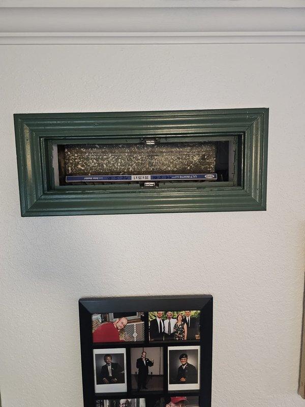 Completed installation of a Lennox Merit ML296V 96% AFUE 90,000 BTU two-stage gas furnace in residential utility closet. Installation included establishing new gas line connections with black iron pipe, running electrical service to unit, installing PVC venting system for intake and exhaust, and mounting programmable thermostat on interior wall for system control.