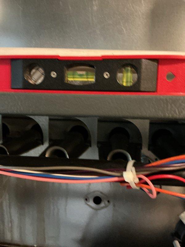 Completed comprehensive maintenance on 19-year-old gas furnace system. Inspected and replaced air filter, verified proper airflow direction and filter installation. Performed electrical system diagnostics including terminal connections and wiring integrity check, ensuring all wire connections were secure and properly terminated at junction box. Utilized precision leveling equipment to verify proper mounting and alignment of electrical components. All safety controls tested and operating within manufacturer specifications.