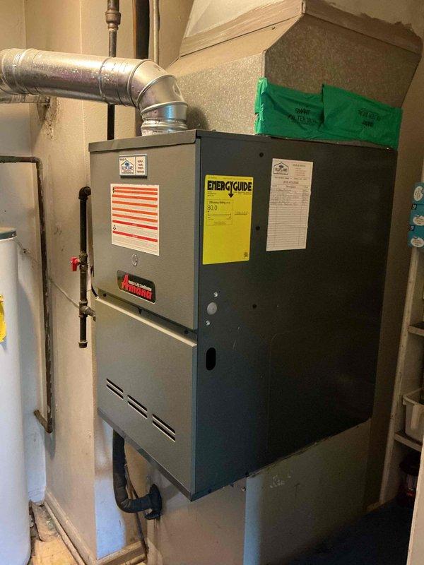Completed annual heating system maintenance and tune-up on 8-year-old residential furnace unit. Performed comprehensive inspection of all components including electrical connections, capacitor (370VAC rated), blower assembly, and gas line connections with shutoff valve. All systems tested and operating within manufacturer specifications.