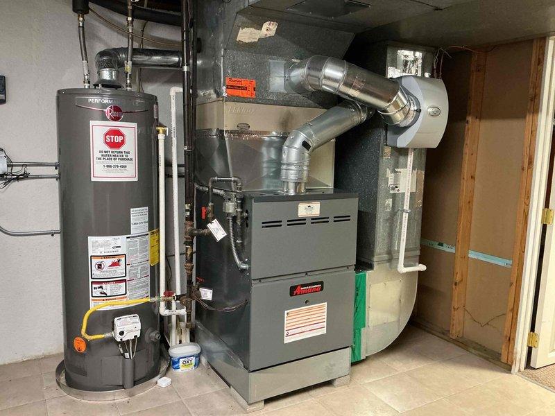 Completed comprehensive furnace tune-up on 6-year-old Amana gas-powered heating system. Performed combustion analysis using Testo 310 II flue gas analyzer, recording stack temperature of 336.2°F, oxygen level at 10.7%, carbon monoxide at 8 ppm (16 ppm air-free), and efficiency at 80.0% with CO2 at 5.77%. All combustion readings fell within acceptable parameters for safe operation. Inspected all system components, verified proper gas line connections, and confirmed furnace operational status for the heating season.