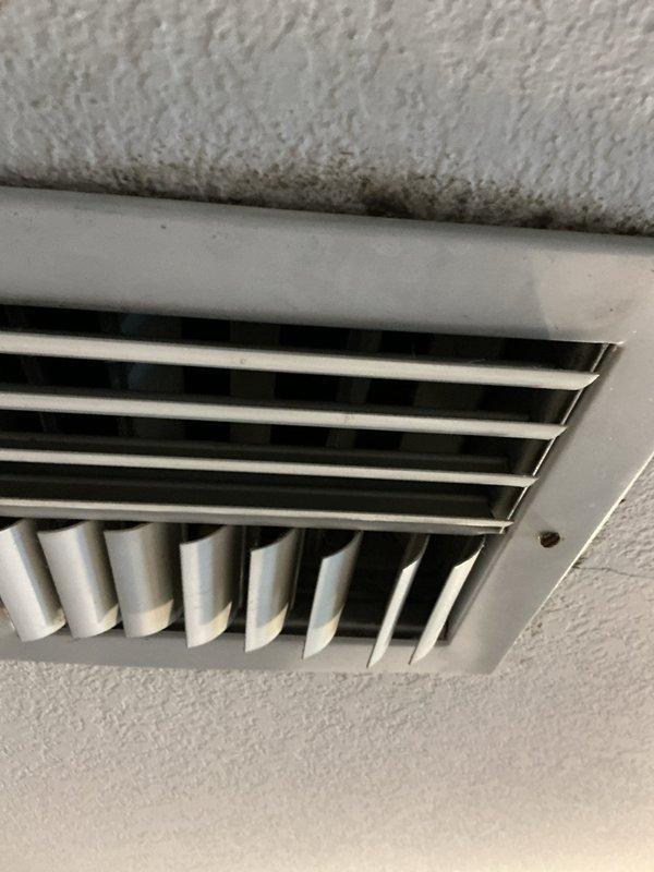 Completed routine tune-up and preventive maintenance on 5-year-old heat pump system. Inspected internal electrical components, capacitor, and wiring connections; all found to be in proper working condition. Noted significant dust accumulation and staining around supply vent register, indicating need for improved filtration or more frequent filter changes to maintain optimal air quality and system efficiency.