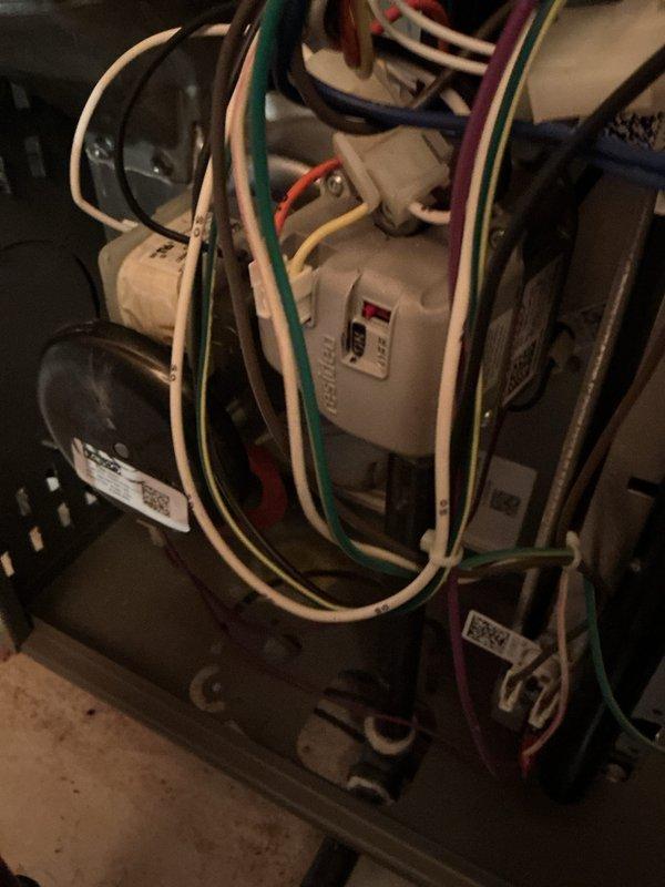 Completed routine tune-up and preventive maintenance on 5-year-old heat pump system. Inspected internal electrical components, capacitor, and wiring connections; all found to be in proper working condition. Noted significant dust accumulation and staining around supply vent register, indicating need for improved filtration or more frequent filter changes to maintain optimal air quality and system efficiency.