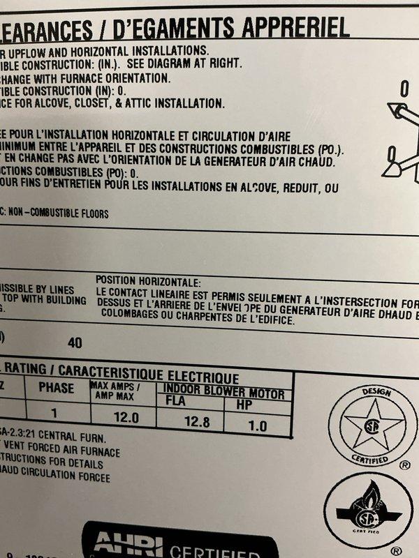 Completed preventative maintenance tune-up on 3-year-old gas forced air furnace. Inspected unit specifications, verified proper installation clearances, and examined evaporative humidifier system including honeycomb media pad and water distribution components. All equipment operating within manufacturer specifications with no deficiencies noted.