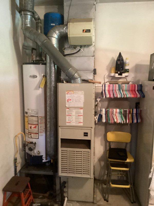 Completed comprehensive full system replacement estimate for residential HVAC equipment. Evaluated existing outdoor condensing unit with copper fin coil and indoor furnace system with connected ductwork, photographed current equipment configuration and installation conditions. Provided detailed replacement options and specifications for complete heating and cooling system upgrade.