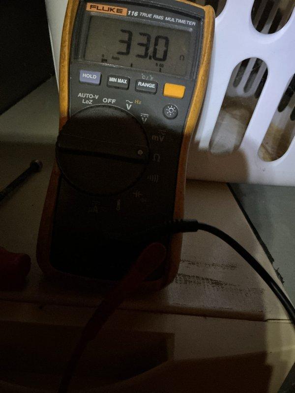Performed annual maintenance on a 19-year-old gas furnace, verifying system operation and checking static pressure with a dual-port manometer (7.23 inWC / 7.09 inWC readings) and testing component resistance with a multimeter (33.0 Ω). Confirmed the customer has a furnace-only system and advised that a replacement air filter is needed.