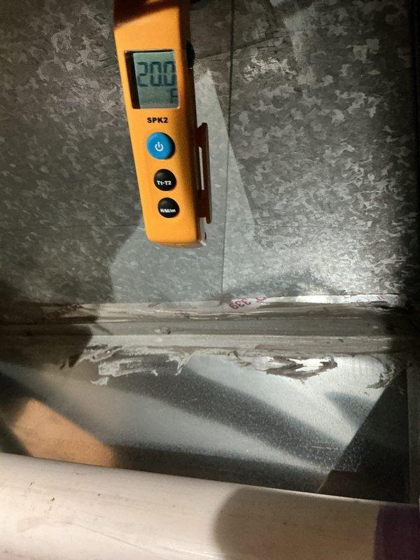 Performed a scheduled maintenance on a 5-year-old basement-installed gas furnace, including inspection of the return air filter, which was found in serviceable condition with no heavy loading. Verified heating performance by measuring supply plenum temperature at approximately 200°F, and inspected plenum seams and sealant for integrity. Equipment is operating normally.