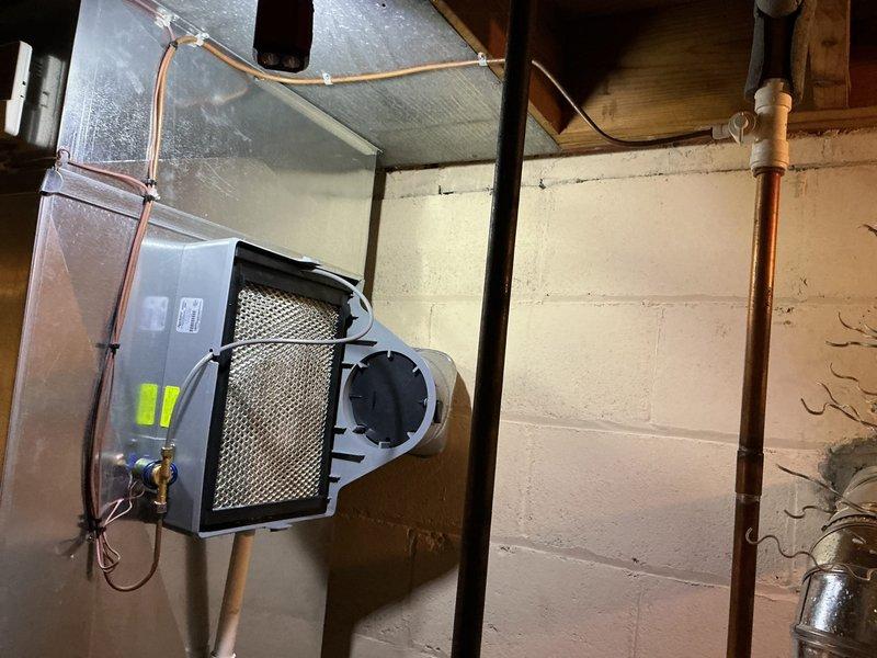 Performed annual maintenance on a 14-year-old gas furnace, including a combustion analysis with a testo 310 II that confirmed safe operation at 96.5% efficiency, 53 ppm CO, 7.24% CO2, 8.1% O2, and 93.5°F stack temperature. Inspected the furnace and associated ductwork, including the bypass-style humidifier and its water supply and drain connections, and verified proper system operation at completion.