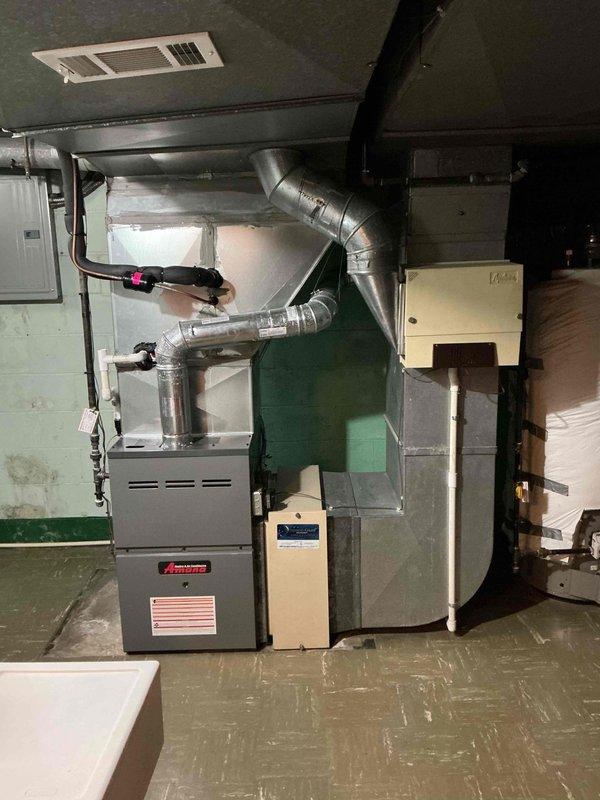 Performed a seasonal tune-up on a 6-year-old Amana natural gas furnace, inspecting the flue, condensate drain, refrigerant line, and plenum connections for leaks, corrosion, and proper support. Conducted a combustion analysis with a Testo 310 II, recording a stack temperature of 358.6°F, 9.2% O₂, 6.62% CO₂, 16 ppm CO (29 ppm air-free), and 80.3% efficiency, with all readings within acceptable limits for safe operation. System is operating normally with no visible frost, ice, or rust.