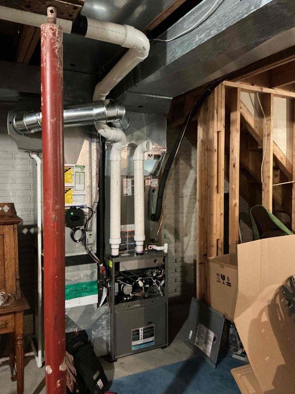Installed a new gas furnace, connecting the PVC combustion air and vent piping, supply plenum, and refrigerant line set, then inspected the burner, blower, and wiring components. Addressed the customer's complaint of loud rumbling transmitted through the home by verifying the duct connections and installation to reduce vibration and airflow noise.