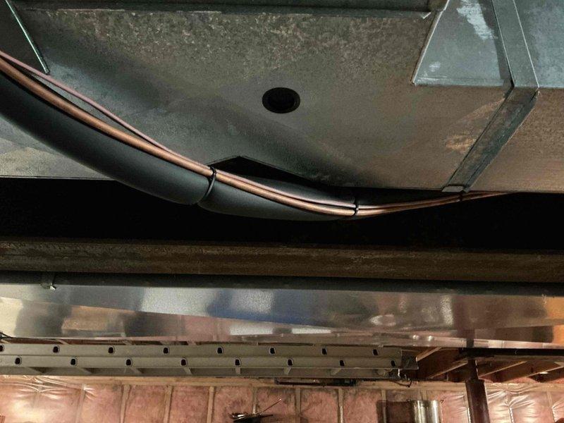 Installed a new gas furnace, connecting the PVC combustion air and vent piping, supply plenum, and refrigerant line set, then inspected the burner, blower, and wiring components. Addressed the customer's complaint of loud rumbling transmitted through the home by verifying the duct connections and installation to reduce vibration and airflow noise.
