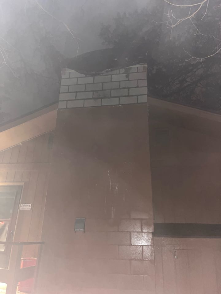 Rebuilt 6 courses of block and poured new crown  Rebuilt 6 courses of block and poured new crown