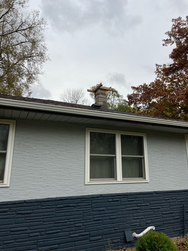 Rebuilt 4 block chimney and poured new crown  Rebuilt 4 block chimney and poured new crown