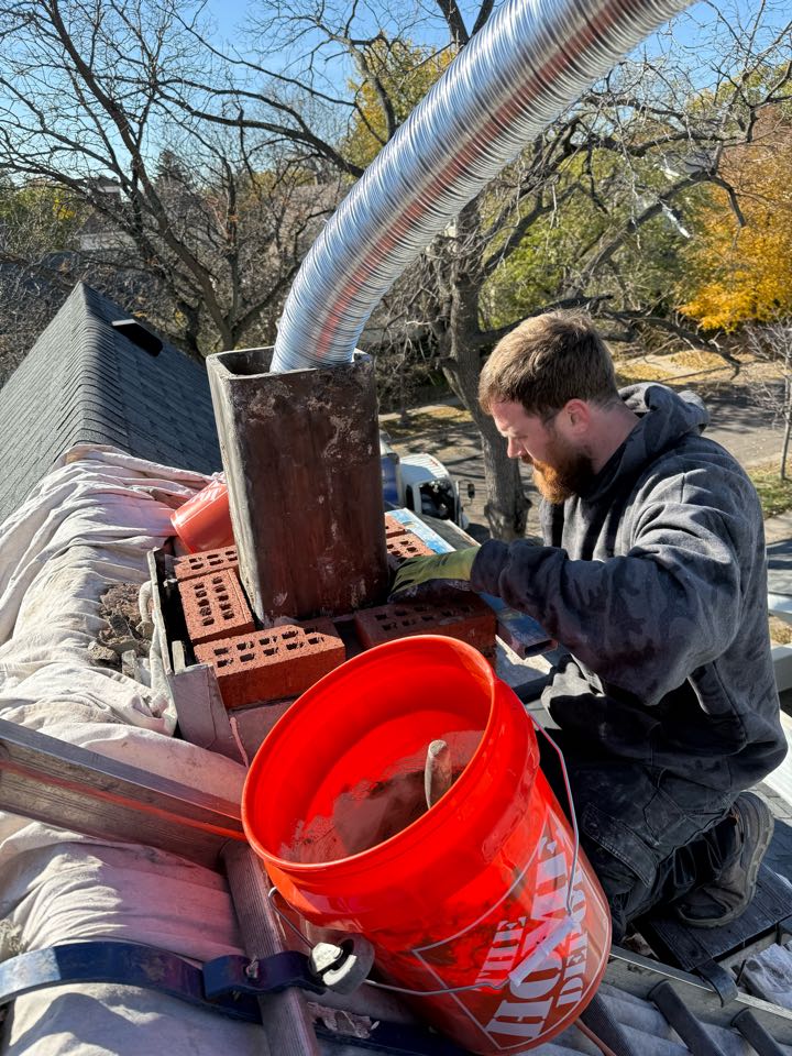 Rebuilt 14 courses of brick