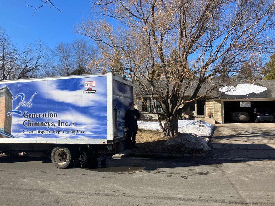 Basement traditional wood burning fireplace reline in Edina 
