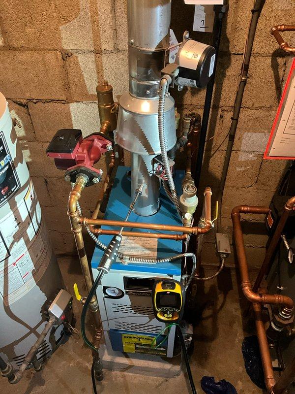 Conducted annual preventative maintenance on customer's boiler system as required by HOA regulations. Performed comprehensive inspection of complete heating assembly including copper piping network, valves, pumps, and digital control panel. System is functioning properly with no issues detected.