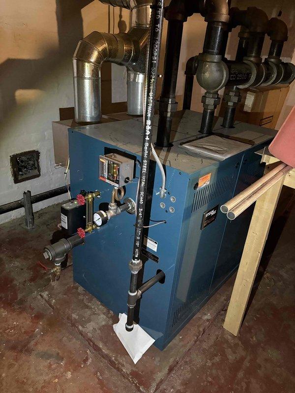 Conducted site assessment for installation of high velocity HVAC system. Examined existing blue boiler system with associated piping, valves, pressure gauges, and control mechanisms. Documented current setup including ductwork configuration and connection points to determine optimal integration strategy for the proposed high velocity system.