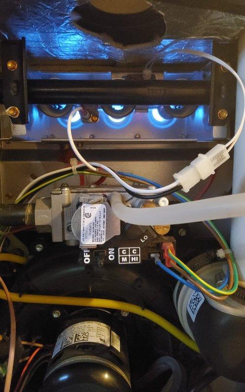 Completed scheduled furnace maintenance service. Inspected burner assembly, confirming proper ignition and flame characteristics. Conducted combustion analysis testing with readings of O2 11.1%, CO 16ppm, CO2 5.6%, with stack temperature at 84.5°F, all within acceptable parameters for safe operation.