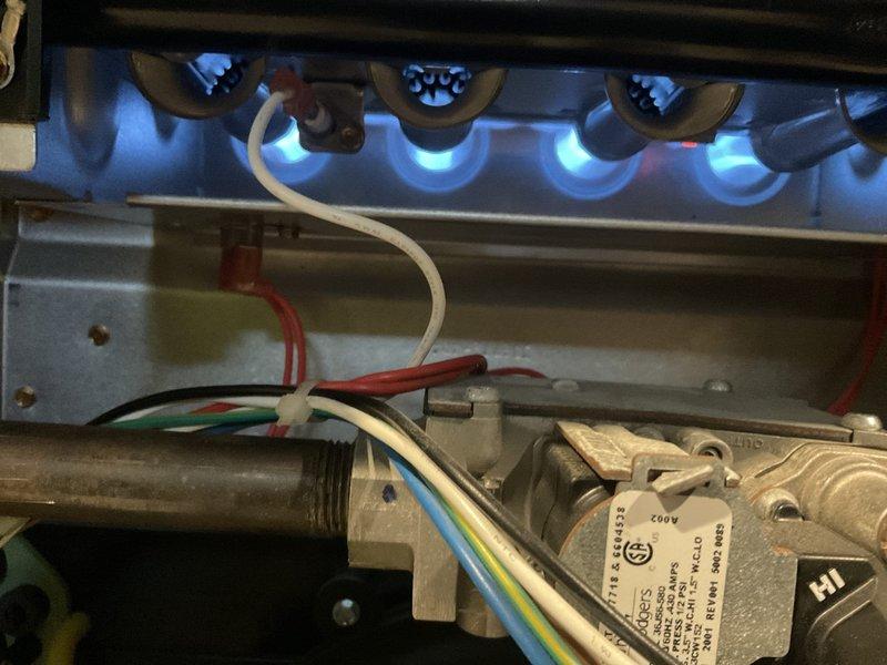 Performed scheduled heating maintenance on customer's system under Home Plan. Conducted combustion analysis with C161 analyzer showing normal CO levels at 14P, CO2 at 2.3%, and operating temperature of 91.8°F. Verified proper burner operation with even blue flame pattern across all tubes, and inspected all electrical connections and gas valve assembly for proper function.