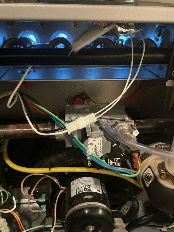 Performed scheduled Heating Tune Up on 5-year-old system. Inspected furnace interior, visually examining burners with proper blue flame pattern and checking heat exchanger integrity. Cleaned blower wheel assembly which had moderate dust accumulation to improve system efficiency and airflow.