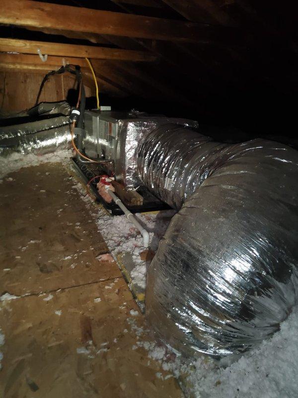 Responded to callback for zone control issues following previous repair. Accessed attic to inspect HVAC system with flexible metallic ductwork and identified control board malfunction affecting multiple zones. Repaired wiring connections to zone dampers and verified proper operation of all zones.