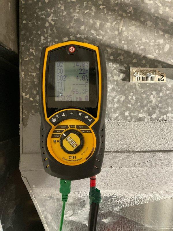 Performed annual heating maintenance on 6-year-old furnace under Home Plan agreement. Inspected burner assembly confirming proper flame pattern with clean blue flames. Conducted combustion analysis with UEi C161 analyzer showing CO2 at 4.8% and temperature at 86.3°F, indicating efficient operation within manufacturer specifications.