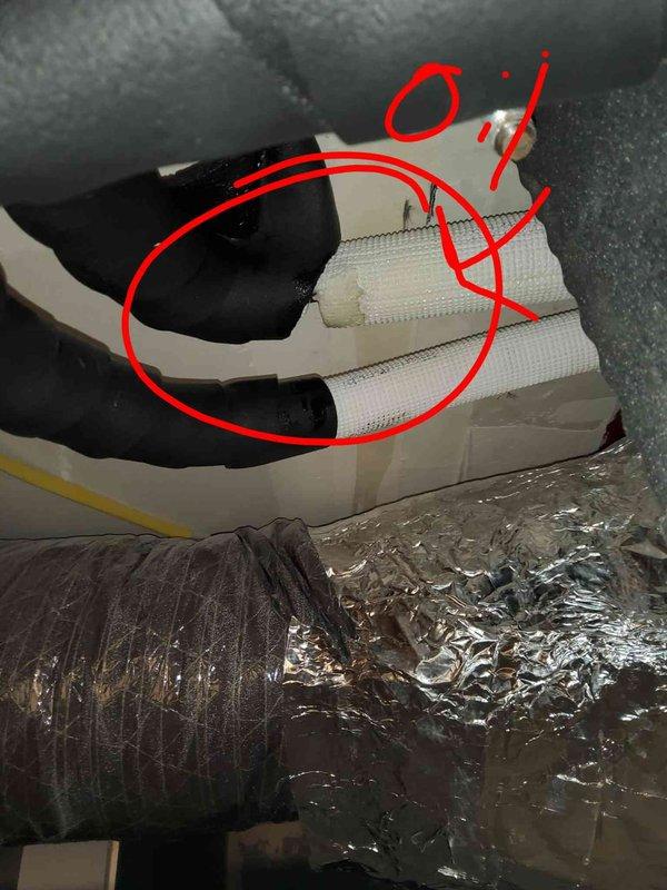 Responded to commercial building service call for J.M.K. furnace not producing heat. Thermostat limited to 63°F maximum. Discovered oil leak in mini-split system requiring insulation repair. Completed ductwork insulation replacement and sealed exposed connections with foil tape to restore proper system operation.