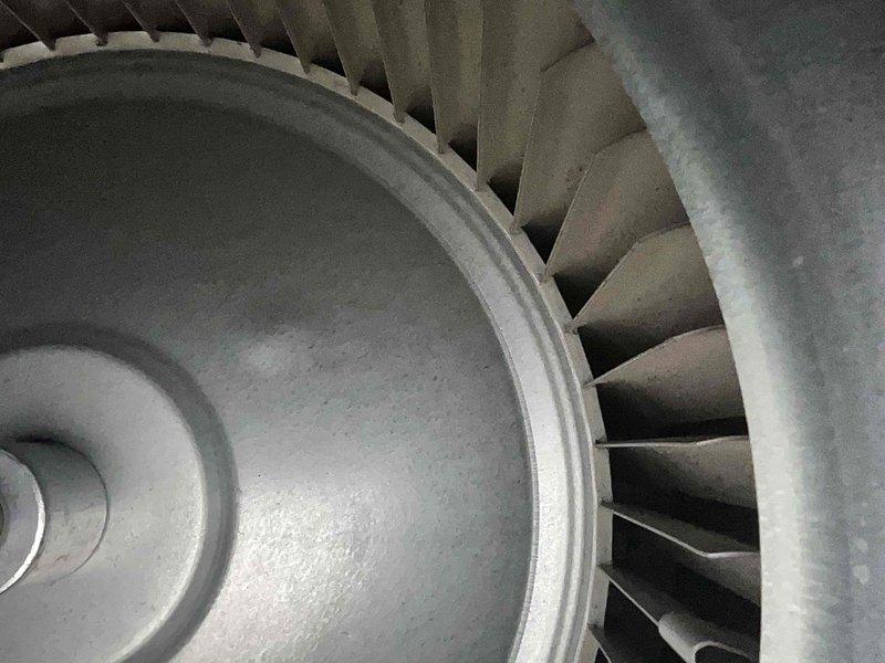 Performed routine maintenance on a 2-year-old gas furnace. Inspected burner assembly with proper blue flame indicating complete combustion. Examined blower wheel assembly for proper operation and cleaned components. All electrical connections and gas valve functioning normally.