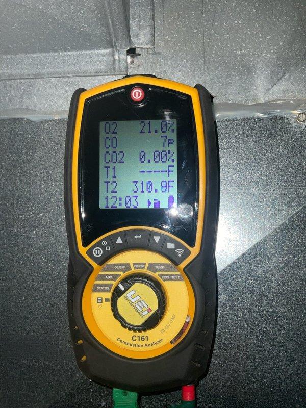 Performed maintenance service on 10+ year old Goodman furnace. Conducted combustion analysis with C161 analyzer, confirming proper operation with temperatures reaching 310.9°F. Inspected heat exchanger and verified all electrical connections were secure and properly bundled.