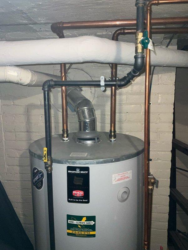 Performed scheduled maintenance on dual boiler heating system (main house and garage snow melt system). Documented leaking pump with comprehensive photos of the volute and motor assembly for Armstrong warranty claim consideration. Inspected steam humidifier functionality as requested and verified proper operation of both heating systems.
