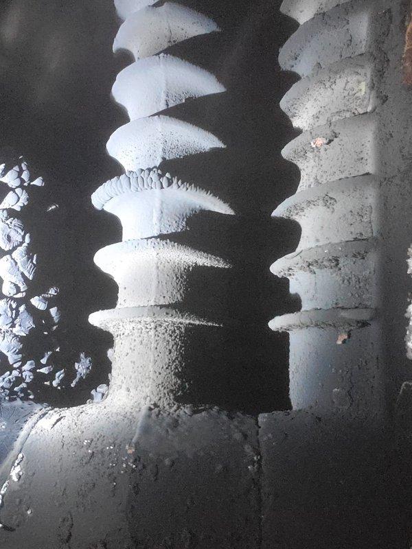 Responded to no heat call for 15-year-old furnace system. Diagnostic inspection revealed significant dust buildup on inducer motor components and signs of corrosion on heat exchanger. Performed comprehensive cleaning of inducer assembly to restore proper airflow and functionality. System now operating within normal parameters with restored heat output.