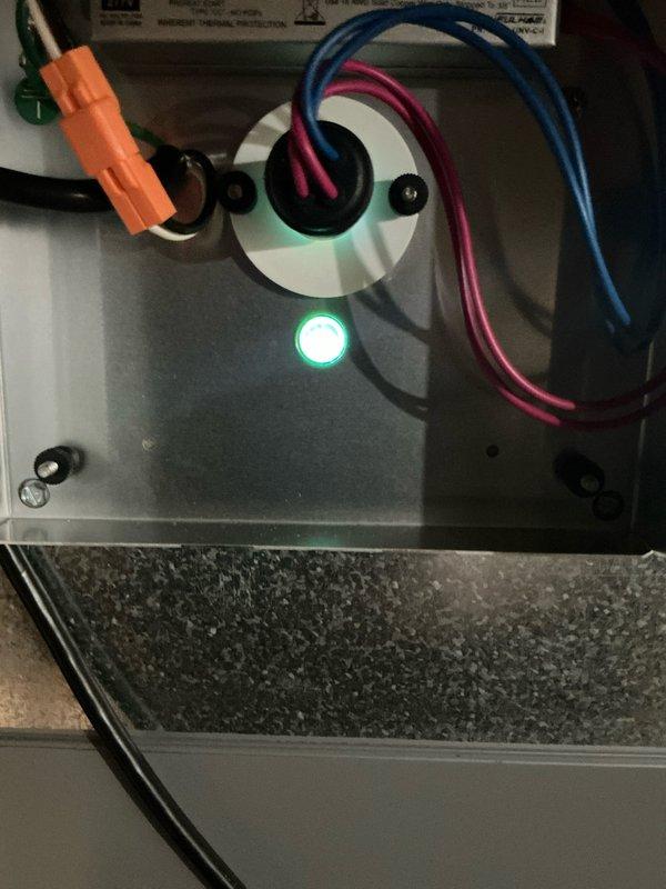 Performed scheduled heating tune-up on system following multiple rescheduling events. Inspected blower wheel assembly for proper operation and condition, finding it in normal working order with no visible damage. Examined control panel wiring and connections, noting all components properly secured with operational indicator light functioning correctly. Installed new UV light as required per service plan.