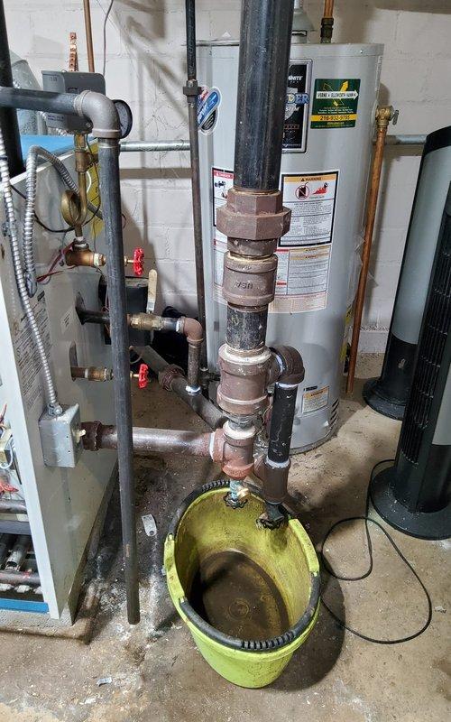 Responded to a no-heat call for a 12-year-old furnace. Inspection revealed faulty burner tubes and heat exchanger issues, as evidenced by irregular flame pattern and discoloration. Cleaned burner assembly, replaced defective components, and verified proper operation with successful ignition and normal flame characteristics.